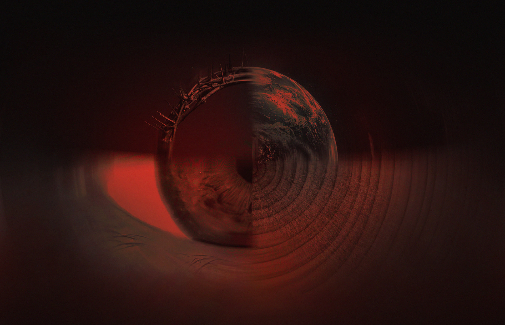 A crown of thorns encircling the earth, seen within an open eye